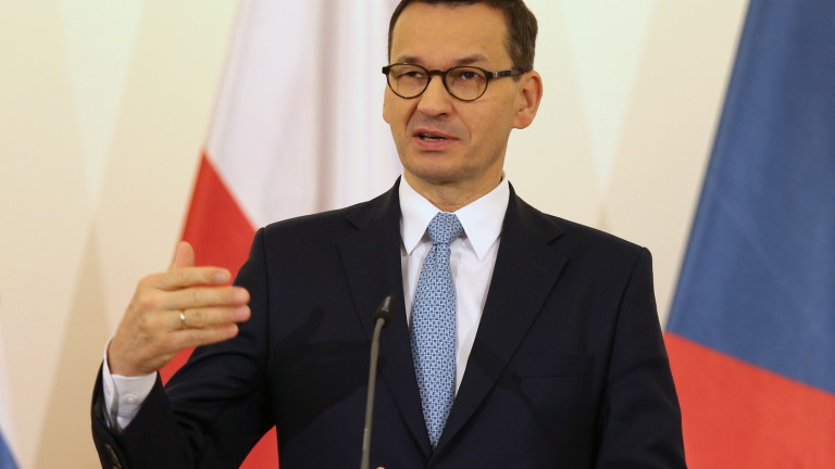epa07973843 Polish Prime Minister Mateusz Morawiecki attends a press conference during the Visegrad Group (V4) Friends of Cohesion summit in Prague, Czech Republic, 05 November 2019.  EPA/MILAN KAMMERMAYER