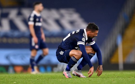 MANCHESTER, ENGLAND - NOVEMBER 03: Jose Holebas of Olympiacos reacts at full-time during the UEFA Champions League Group C stage match between Manchester City and Olympiacos FC at Etihad Stadium on November 03, 2020 in Manchester, England. Football Stadiums around Europe remain empty due to the Coronavirus Pandemic as Government social distancing laws prohibit fans inside venues resulting in fixtures being played behind closed doors. (Photo by Laurence Griffiths/Getty Images)