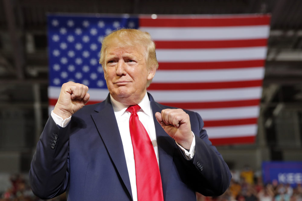 In this July 17, 2019, photo, President Donald Trump arrives to speak at a campaign rally at Williams Arena in Greenville, N.C. (AP Photo/Carolyn Kaster)