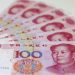 epa04986231 (FILE) A file picture dated 12 August 2015 shows Chinese yuan banknotes in Beijing, China, 12 August 2015. According to media reports on 21 October 2015, People's Bank of China (PBC or PBOC), the central bank of China, launched a yuan-denominated bond auction in London, Britain. The move, said to be made for the first time outside of China, intends to internationalize China's currency facilitating cross-border trade and investment in the offshore market. The note, worth five billion yuan (about 690 million euro or 786 million US dollar), has an interest rate of 3.15 percent and its falls are due in 2016. The central bank's announcement was made as Chinese President Xi Jinping is in Britain on a four-day official visit.  EPA/WU HONG