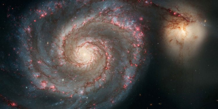 The spiral-shaped Whirlpool galaxy may be the host of the first planet spotted outside of the Milky Way.