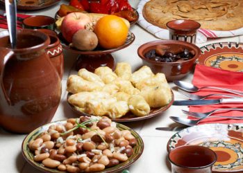 Table setup for Christmas Eve with traditional Bulgarian vegetarian food
