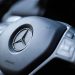Dartmouth, Nova Scotia, Canada - August 1, 2015: Mercedes steering wheel with user controls in a Mercedes GLK250.  The Mercedes GLK250 BlueTEC turbodiesel is a luxury crossover that is rated at 200-hp, with 369 lb-ft of torque. The first GLK series vehicle went on sale for the 2008 model year and continued to the 2015 model year.